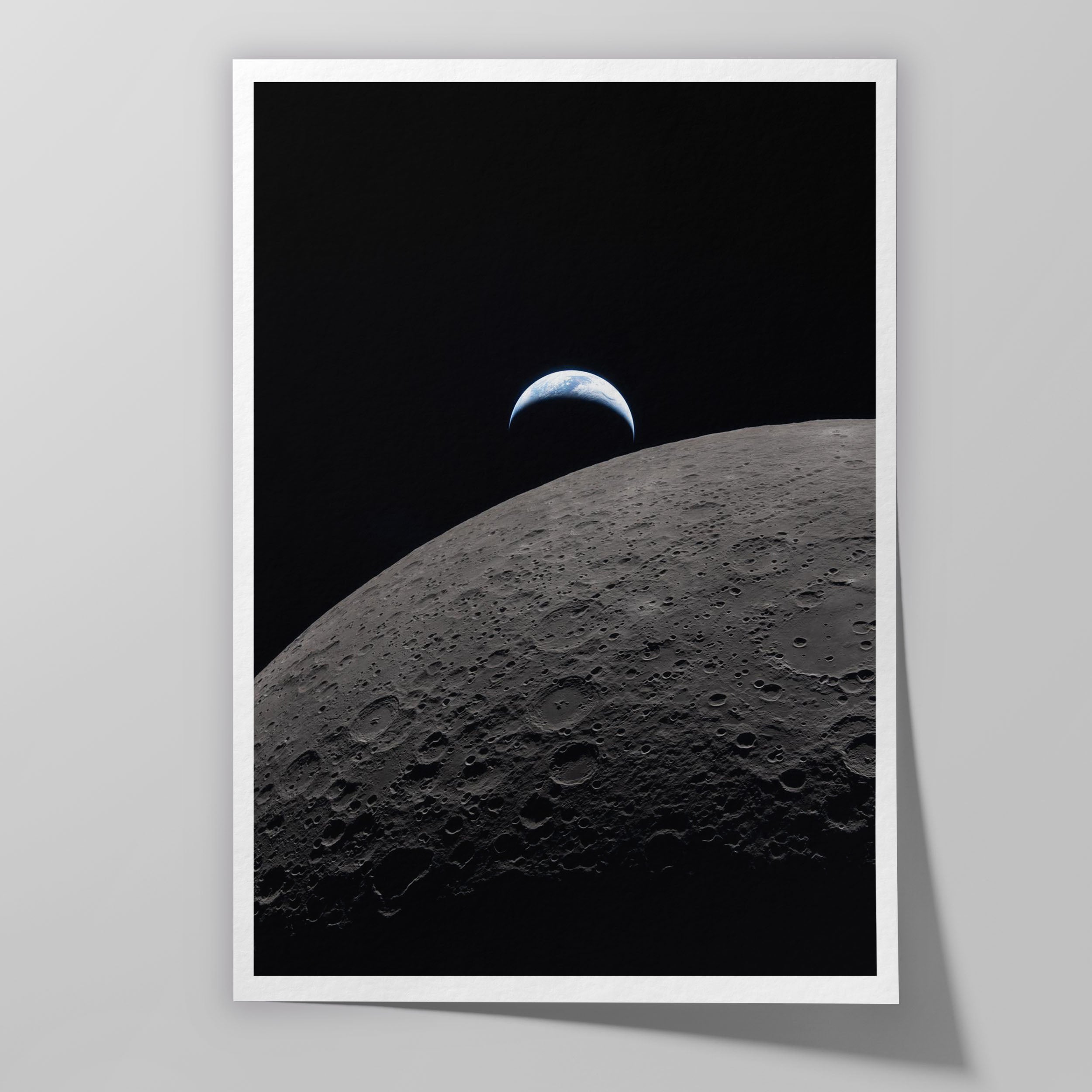A crescent Earth photographed by the Artemis II crew from deep space, with clouds visible over Australia and Oceania.