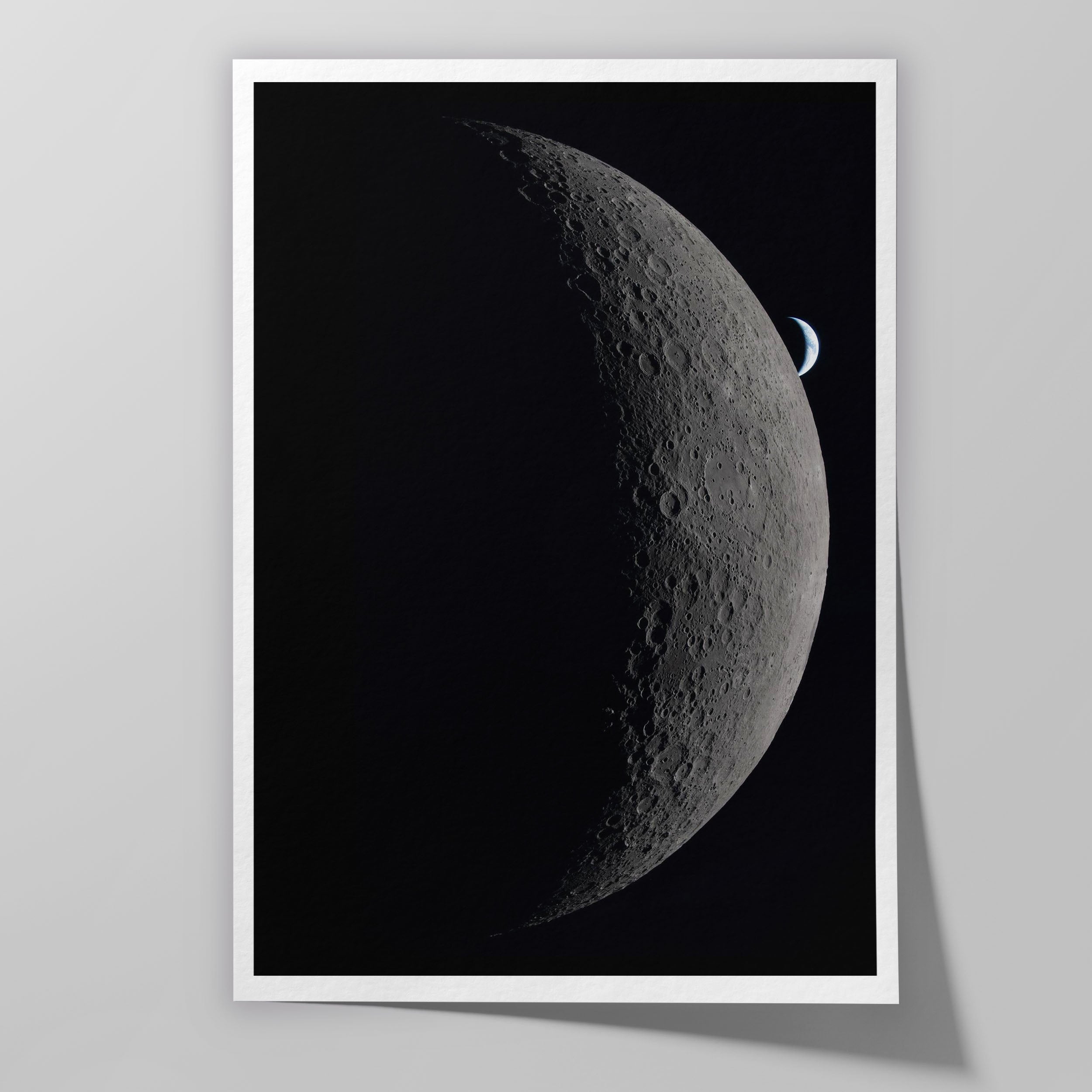 Earth setting beyond the Moon’s curved limb during Artemis II, with Orientale Basin, Hertzsprung Basin, Vavilov, and secondary crater chains visible on the lunar farside.