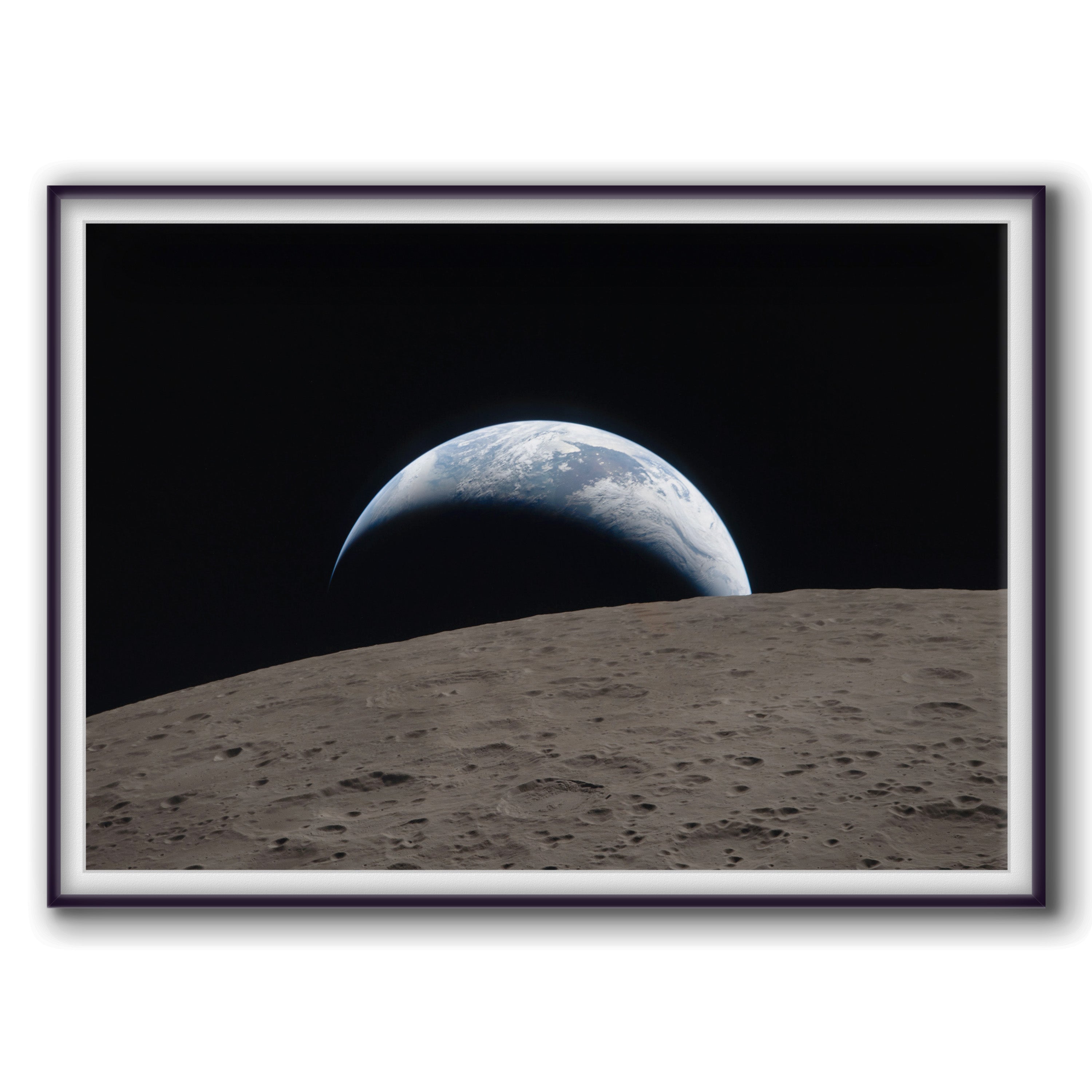 A crescent Earth setting behind the cratered lunar horizon, photographed by the Artemis II crew during the Moon flyby.